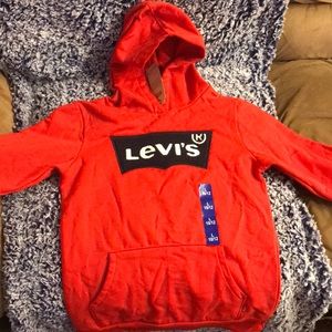 Levi’s red sweater